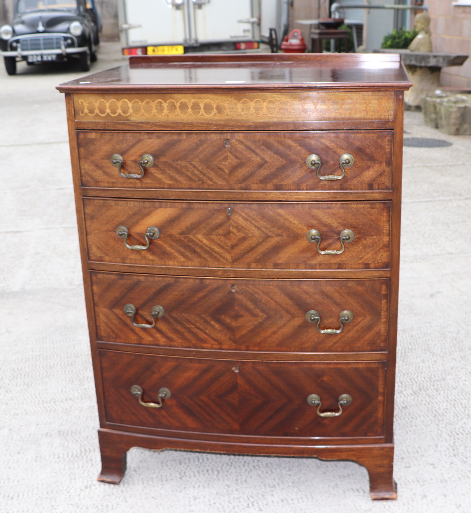 An Edwardian mahogany chest of four graduated long drawers, on bracket feet, 76cms wide. Condition - Image 3 of 13