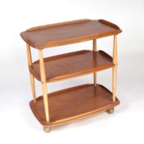 An Ercol Golden Dawn three-tier trolley, 72cms wide. Condition Report 46cms depth and 72cms high.