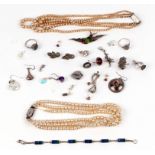 A quantity of assorted silver and other costume jewellery to include a Swift brooch, drop