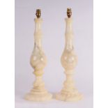 A pair of alabaster baluster form table lamps, 53cms high (2).