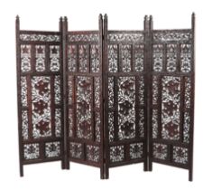 An Anglo-Indian hardwood pierced and carved four-fold screen, 37cms wide closed.