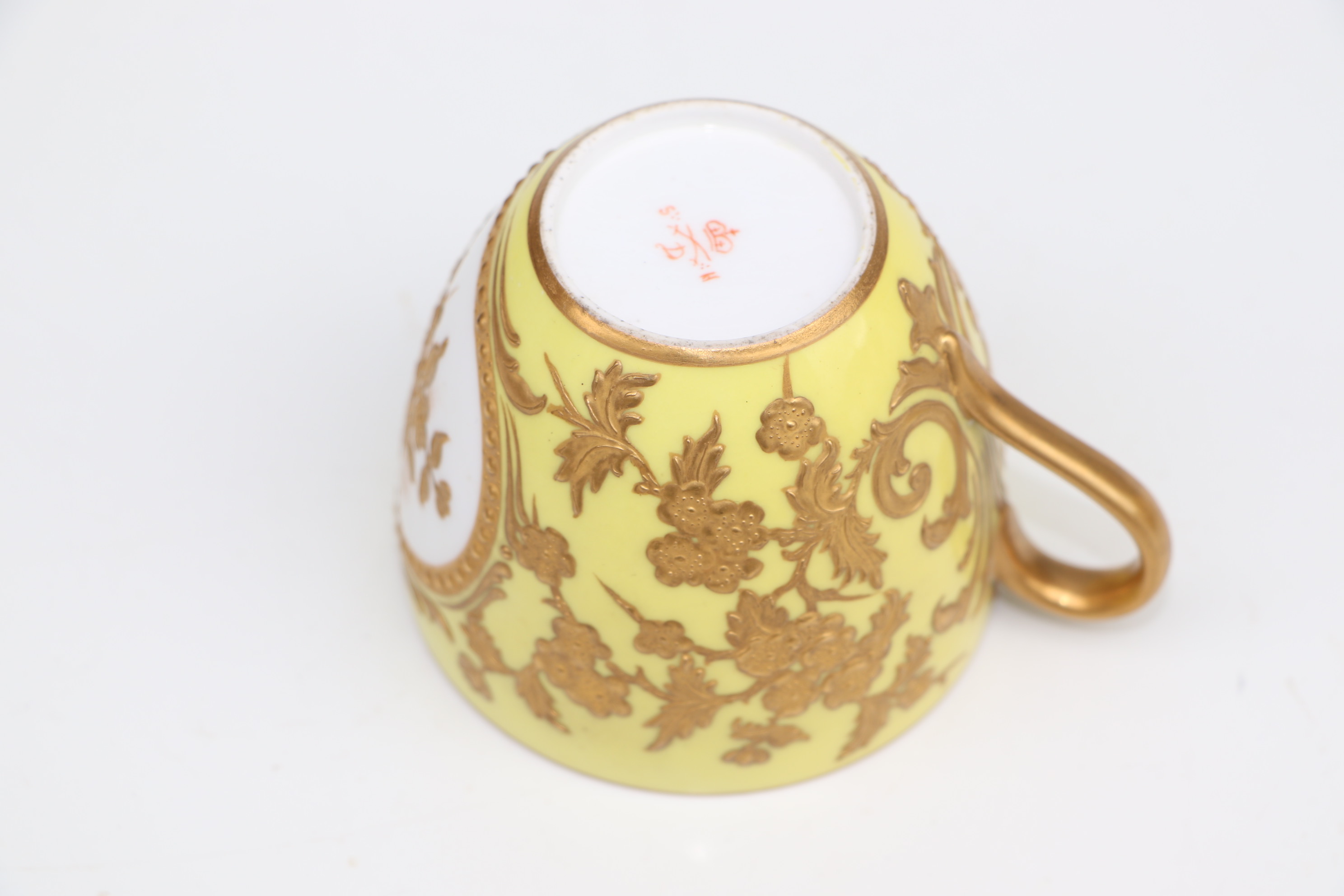 A pair of Derby cabinet cups and saucers decorated with gilded flowers, on a yellow ground; together - Image 3 of 10