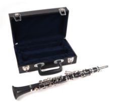 A b-flat clarinet, cased.