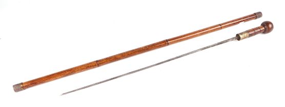 A cane shafted French sword stick with square tapering blade, marked to blade OUZY-PARIS. Blade