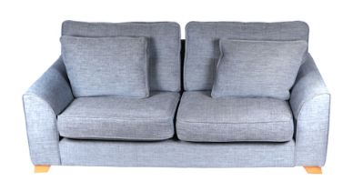 A Modernist design modern upholstered two-seater sofa, approx 196cms wide.