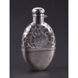 An American sterling silver hip flask with pierced decoration, initialled, 13.5cms high.