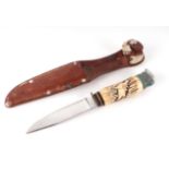 Early 20th century German sheath knife with carved stag horn handle in its original leather