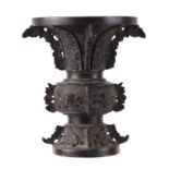 A Chinese bronze Gu vase of traditional form, 18cms high.