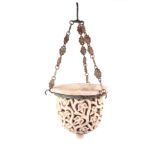 A French style ceramic light pendant with pierced scrolling foliage decoration, 28cms diameter.