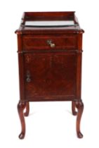 A Louis XV style walnut pot cupboard, the three-quarter gallery above a single drawer and