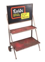 An original late 1960's / 70's Exide Batteries three-tier battery stand trolley.