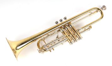 A Rudy Muck 7m brass trumpet, serial no. 2805; together with a Rudy Muck 18m mouthpiece, list no.