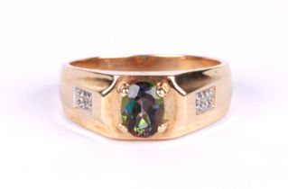 A gentleman's 9ct gold dress ring set with a central oval mystic topaz and diamond set shoulders,