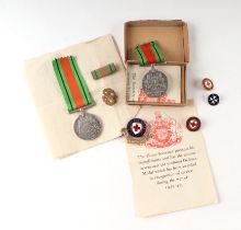 A WW2 Defence Medal with certificate and five British Red Cross Society certificates named to Miss