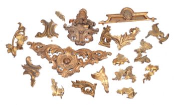 A quantity of giltwood carvings, the largest 64cms wide.
