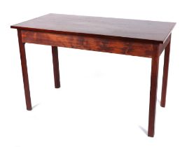 A George III mahogany table on square chamfered legs, 127cms wide. Condition Report The top has been