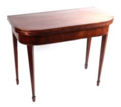 A 19th mahogany tea table with square tapering legs on spade feet. 91cm wide