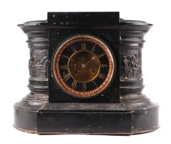 A Victorian black slate mantle clock, the gilded black dial with Roman numerals, fitted with an 8-