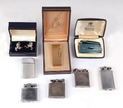 A small collection of cigarette lighters to include Dunhill, Ronson and others.