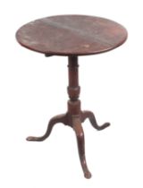 A 19th century mahogany tilt-top occasional table on turned column and tripod base, 55cms