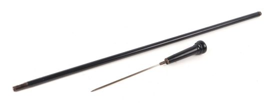 An ebonised swordstick with 22cms stiletto blade, 90cms long.