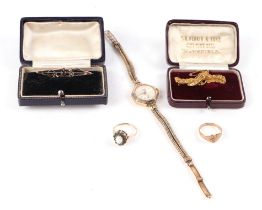 An Edwardian 15ct gold brooch, 4g, cased; together with an Edwardian 9ct gold amethyst and seed