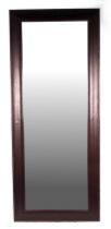 A large modern design leather framed full length wall mirror, 70 by 170cms.