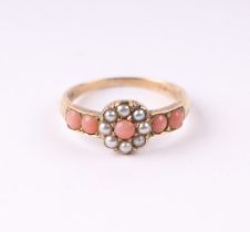 A 9ct gold pearl and coral ring, approx UK size 'P', 2.7g.