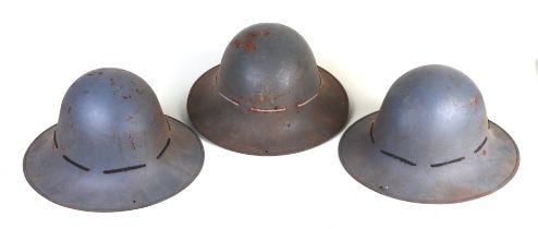 Three WWI Brodie type steel helmets (3).