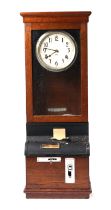 An IBM Clocking In clock, the cream dial with Arabic numerals, in an oak case, 100cms high.