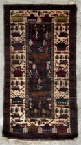 A Persian Afghan war rug with repeating motifs, on a blue and cream ground within a multi border,