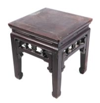 A Chinese hardwood side table with pierced frieze, 45cms wide.