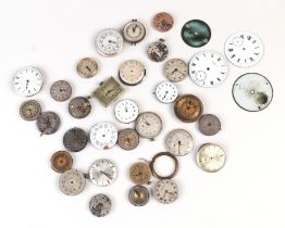 A quantity of watch dials and movements for spares and repairs.