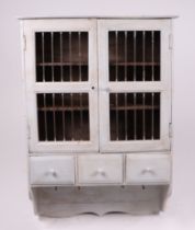 A painted pine wall hanging display cabinet, 64cms wide; together with a wrought iron boot rack,