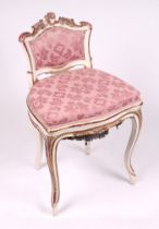 A painted giltwood cello stool with upholstered seat and back, on cabriole front supports.