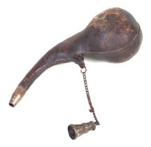 An Arabic or Islamic camel scrotum sack powder flask with brass fittings.