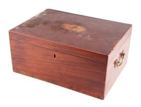 A mahogany box with central shell inlay to the top and two brass carry handles, 37cms wide.