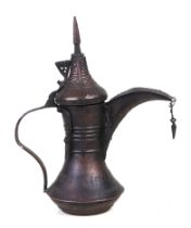 An Turkish / Islamic copper dallah coffee pot, 35cms high.