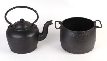 A Holcroft 6 P cast iron two-handled pot; together with a cast iron kettle (2).