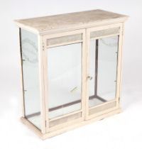 A Victorian painted mahogany glazed table top advertising display cabinet, the sides etched 'John