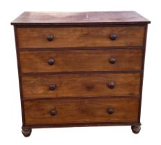 A Victorian mahogany chest of four graduated long drawers, on bun feet, 115cms wide.