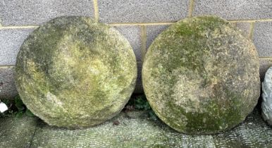 A pair of staddle stone tops, approx 66cms diameter (2). Condition Report The tops are made of