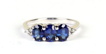 A 14ct white gold Ceylon sapphire and diamond ring, approx UK size 'M', 3g.