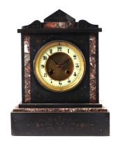 A Victorian black slate mantle clock with rouge marble inlay,the enamel chapter ring with Arabic