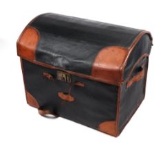 A canvas and leather covered wickerwork dome top travel trunk, 78cms wide.