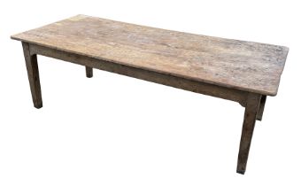 A 19th century poplar kitchen table with an 8-plank rectangular top, single end drawer and square