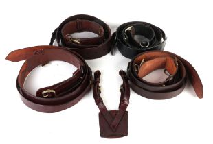 Four Sam Browne leather belts and a sword frog (5).