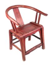 A Chinese red stained hoop-back chair.