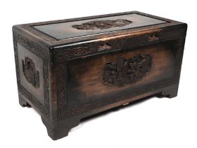 A Chinese carved camphor wood chest, 88cms wide.