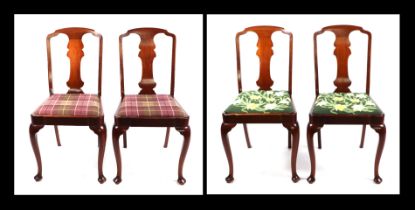 A set of four mahogany dining chairs with drop-in upholstered seats on cabriole front supports.